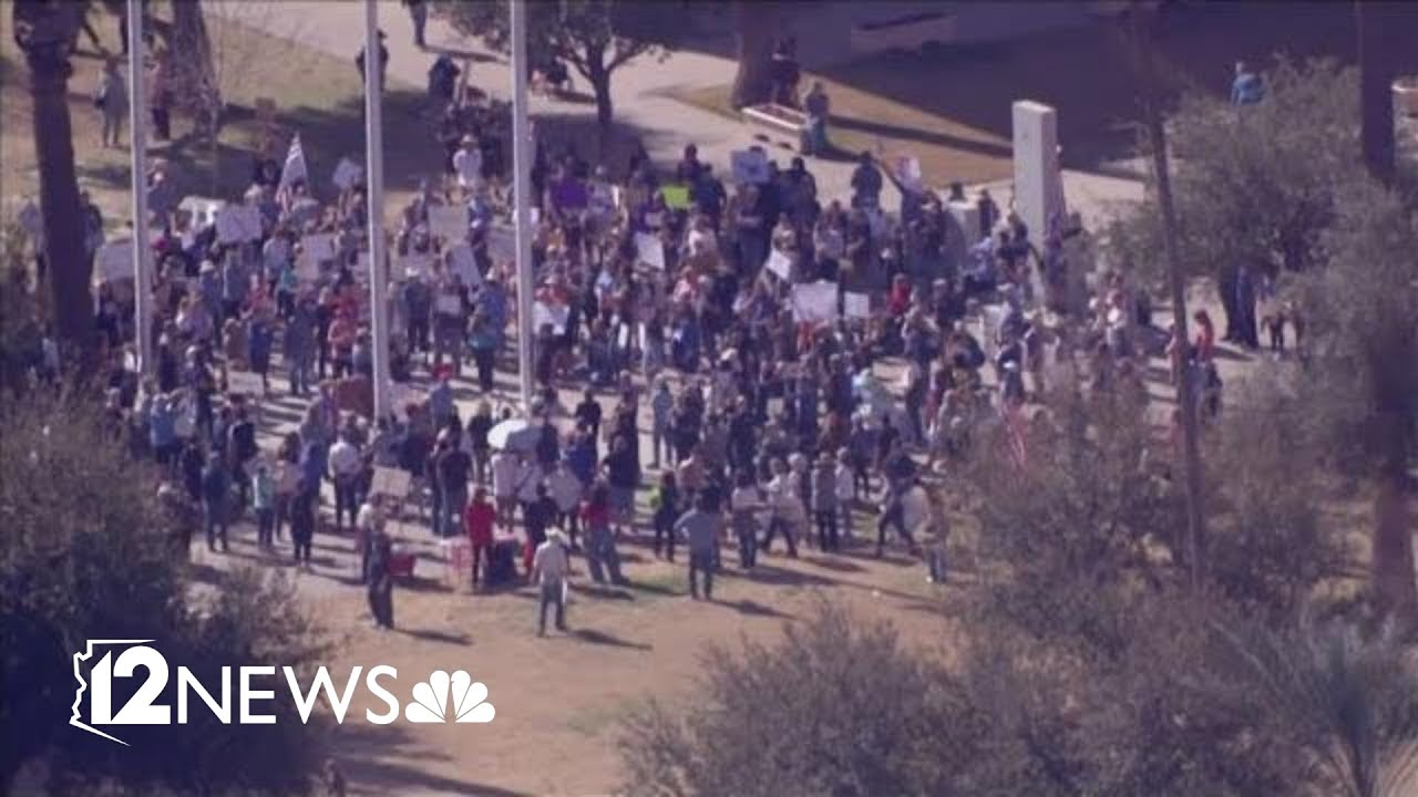Protestors assemble outside Arizona Capitol building
