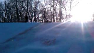 Lucy and aidan sledding 1