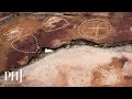 9,000-Year-Old Rock Sketches Prove Early Humans Knew All About Dinosaurs | PHJ