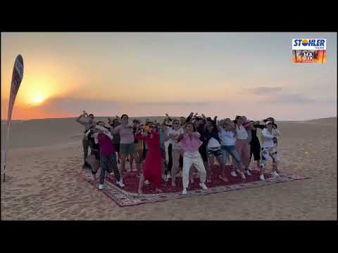MAZIK DANCE Boogie Wonderland on the dunes of Dubai – flash mob with Swiss travel agents
