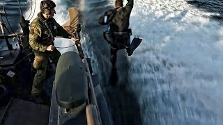 U.S. Recon Marines and Norwegian Coastal Ranger Commandos (KJK) wor...