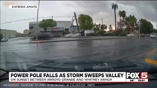 Power pole falls as storm sweeps Las Vegas Valley