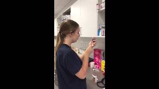 Drawing up medication from a multidose vial