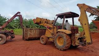 DMR jcb soil loading in Palm 🌴 trees about road work Malaysia ladang jeram padang....