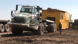 With wide tires and articulated steering, the Rocker Truck can get rig and building moves done that are simply impossible with 