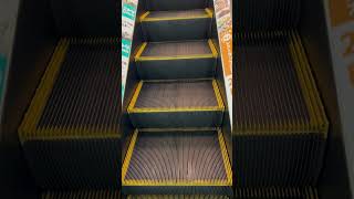 Escalator that straightens out briefly in middle of climb in Japan