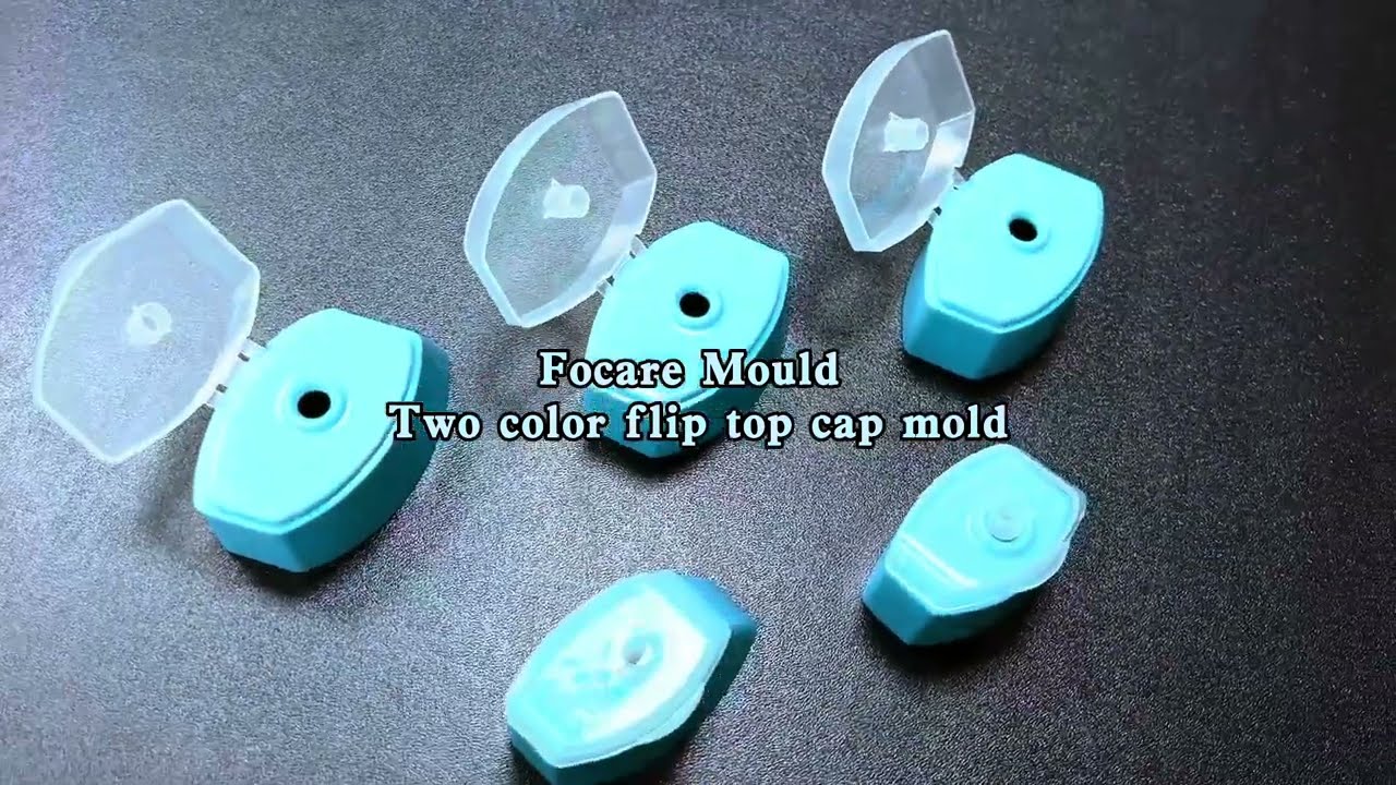 two shot flip top cap injection mold with in mold closing technology