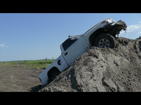 Video: Hvordan fjerner du en lastebil fra en Dodge Dakota?