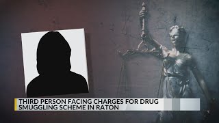 Third person charged in Raton jail drug smuggling scheme