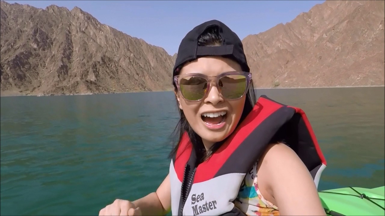 Kayaking in Hatta Lake Dubai by. Smile Like Nina