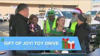 Toledo city employees deliver toys at WTOL 11's Gift of Joy Downtown Gift Drop Thursday
