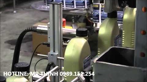 Máy in phun LINX   In trên chai dầu nhớt và in thùng