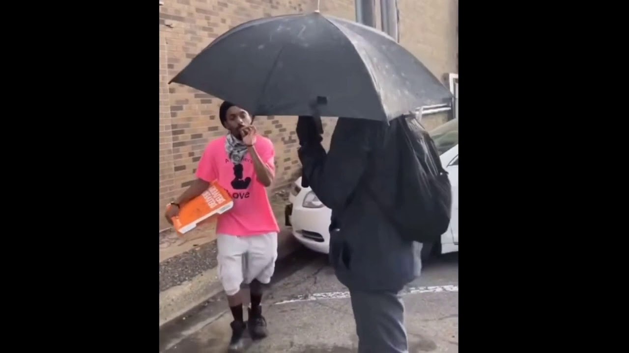 Umbrella Man May 27 2020 Night 2 Of Protests Breaks Auto Zone