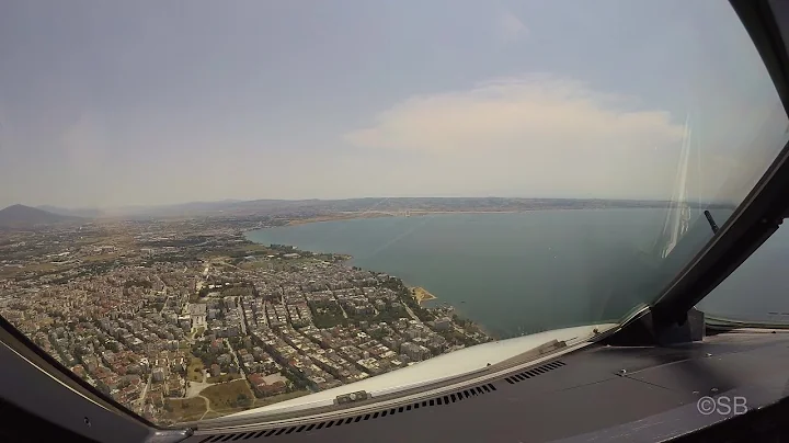 Thessaloniki, Greece: Approach over the city and landing  on runway 16. SKG / LGTS Cockpit view. 4k.