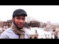 Teju Cole takes in the skyline from the roof of his apartment building in Brooklyn