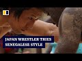 Japanese wrestler moves to senegal to master ancient martial art and fulfil pledge