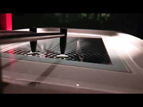 Wave interference in water (slow motion)