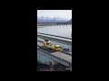 Road Zipper reconfigures lanes on Glenn Highway Knik River bridge