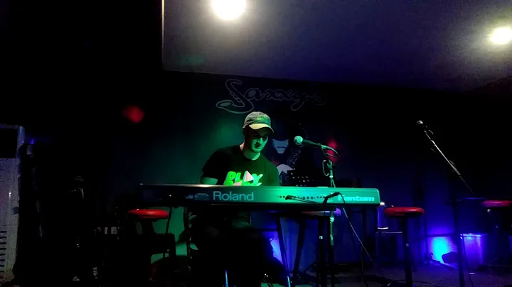 Matthew Samuelson playing keyboard at Saxxy's Bar ...