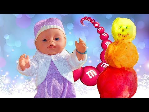 Diana made the world's colorful snowman. Snowman from a multi-colored snow | Diana and Baby Born