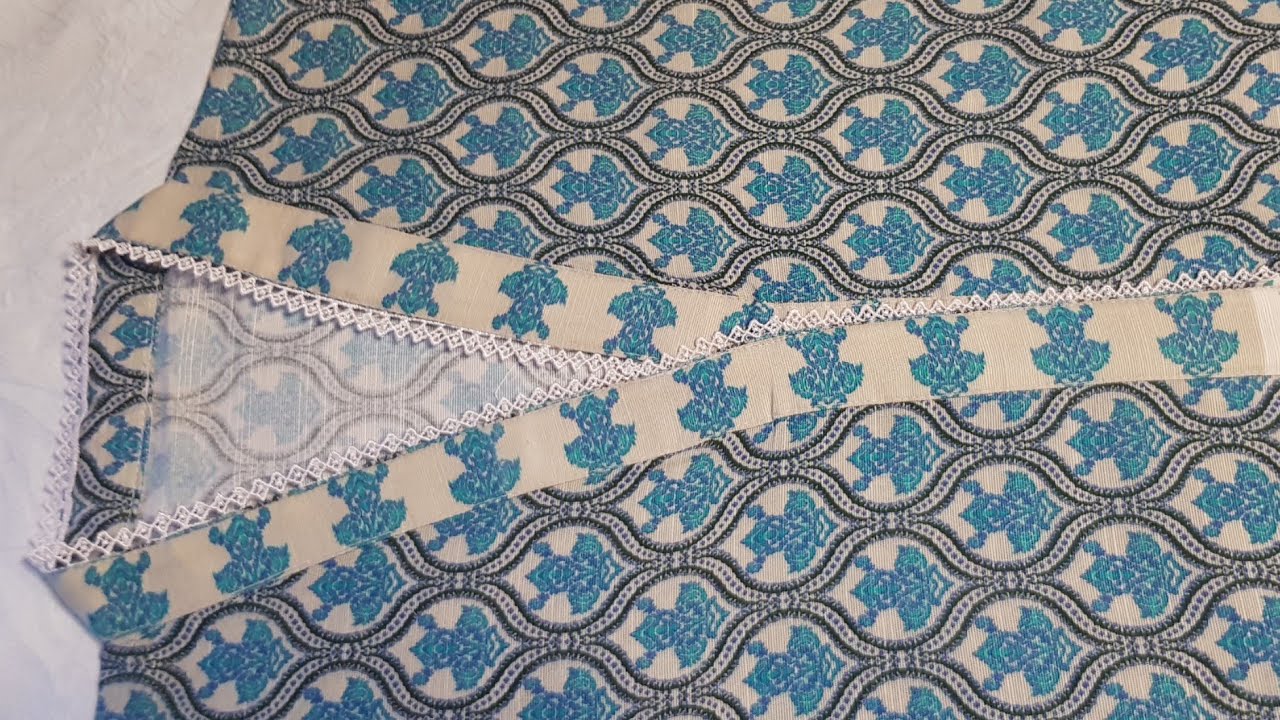 Overlap V-placket neck cutting and stitching.