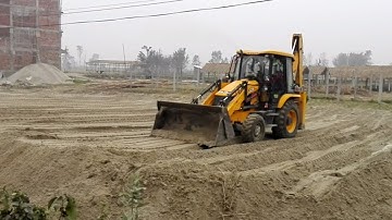 JCB Backhoe-FINALIZES LEVELING THE SANDY GROUND