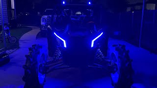 Canam x3 with rocklights and fat whips
