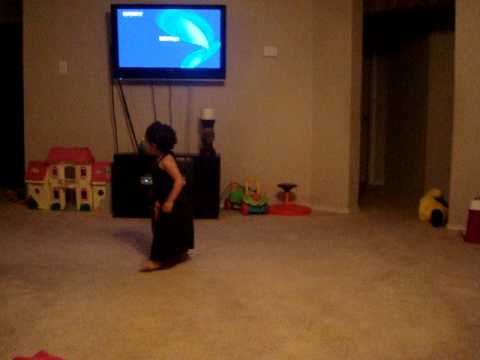 Jasmine dancing to Elvis Crespo.MPG