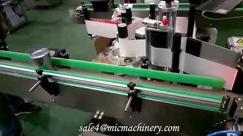 Automatic round bottle labeling machine with position labeling device