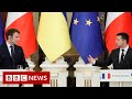 Macron says Putin pledges no new Ukraine escalation - BBC News