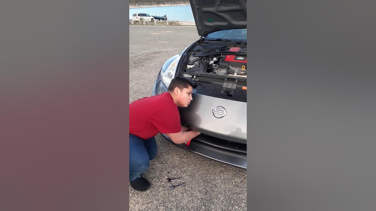 370zTanaka tow strap installation front bumper YouTube