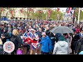 King&#39;s Coronation: Police Lead the Crowds towards Buckingham Palace to see Royal Family on Balcony