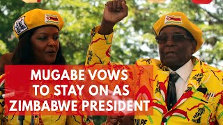 Robert Mugabe defies expectations and vows to stay on as Zimbabwe president