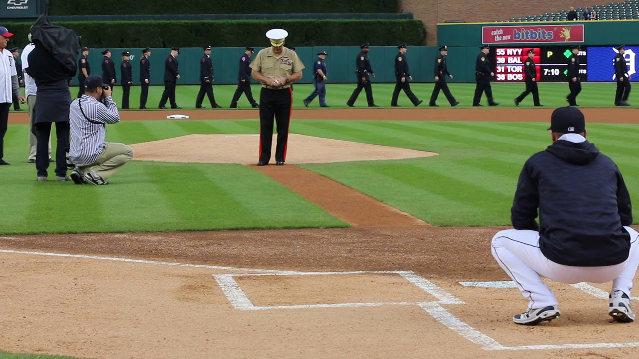 USMC commandant, Gen. Robert B. Neller, throws out the first pitch of the Detroit Tigers home game!