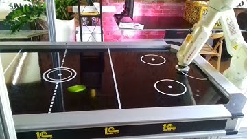 Kawasaki Robotics RS007L Playing Airhockey