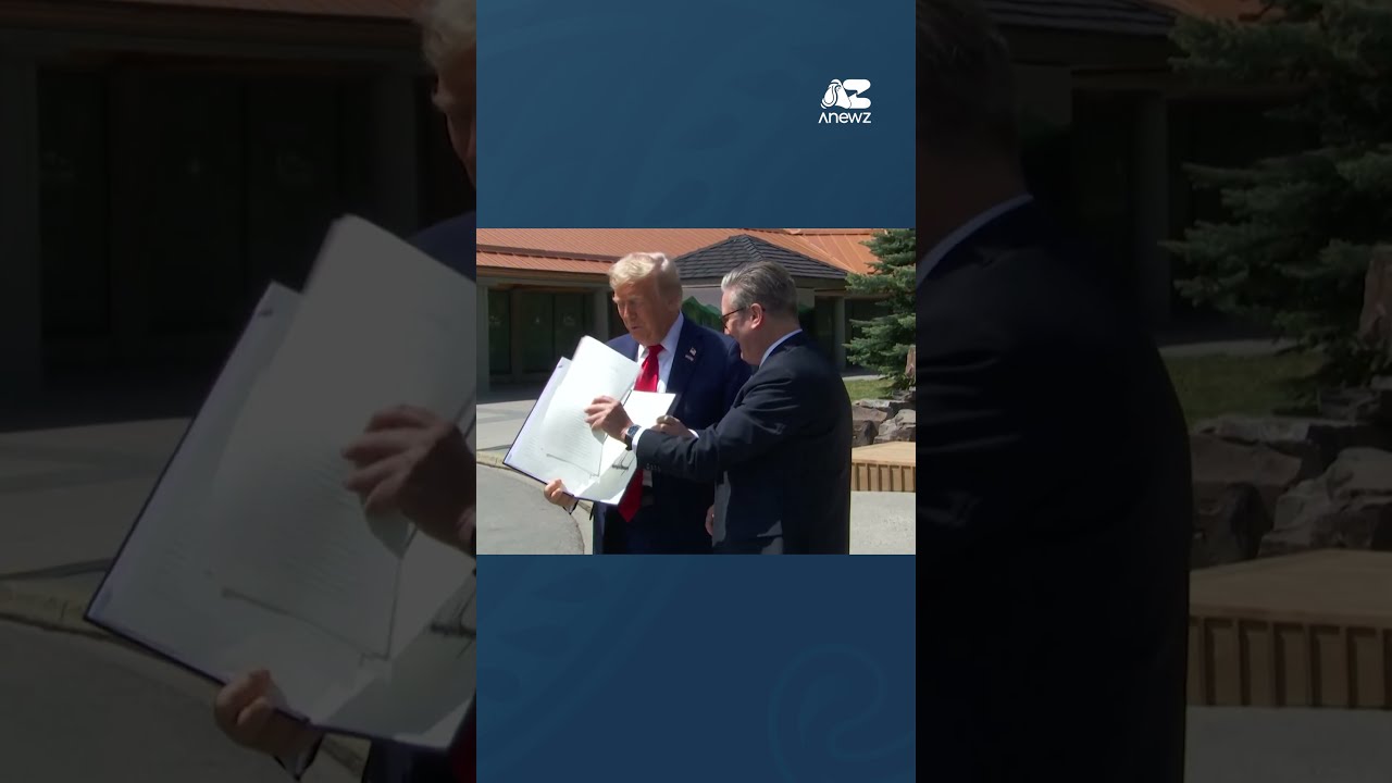 Trump Drops US UK Deal Papers Mistakenly Calls It EU Agreement G7 Summit Moment
