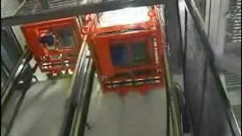 Vertical Conveyor System by Verticon.  High Speed Pallet Handling System.