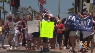 Separate groups of protesters gathered in huntington beach on saturday
with several goals: calling to remove gov. gavin newsom, progressing
the black lives m...
