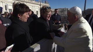 Pope Francis greets actor and director Robert Redford