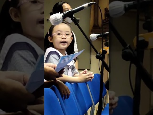 Aleen Singing In Children Choir School At Church class=