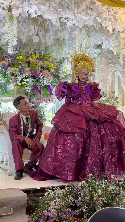 How does a bride in a big dress sit?
