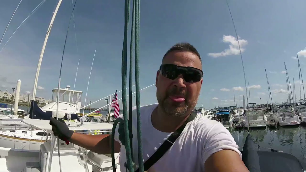 Climbing the mast of a Catalina 30 Sailboat with a block and tackle