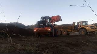 Loading truck using a front end Wheel Loader..