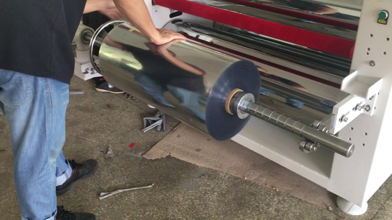 A 1204 PET Rigid Film Roll to Sheet Cutting Machine