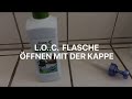L.O.C. Flasche öffnen mit der Kappe./  Открыть L.O.C.  с помощью колпочка.
