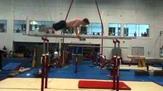 Front uprise double front tuck - parallel bars