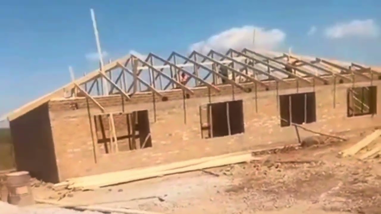 Анализ трудозатрат при строительстве дома в сельской местности Зимбабве.