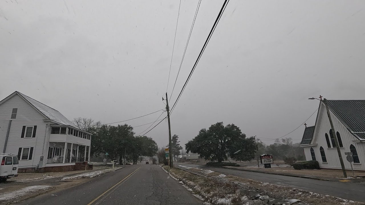 Light snow as we roll through Graniteville