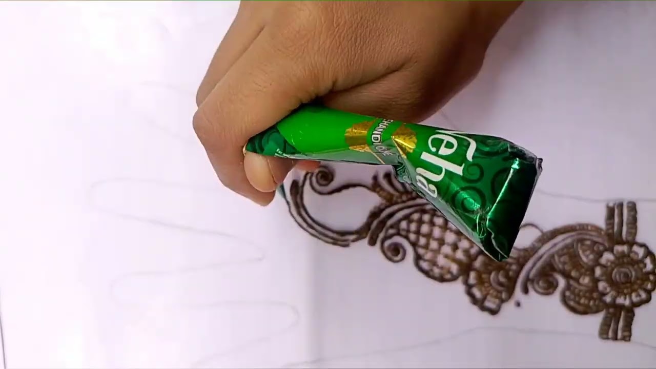 Indo-Arabic half hand mehndi (vertical trail design) 