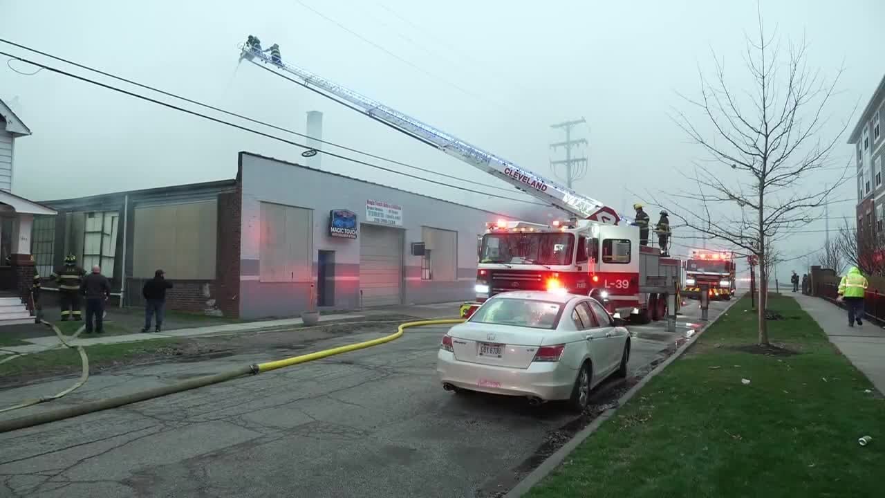 Cleveland firefighters battle west side building fire - YouTube